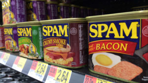 SPAM lines the shelves with many different flavors. This is on a blog post about business name help based on SPAM's name. 
